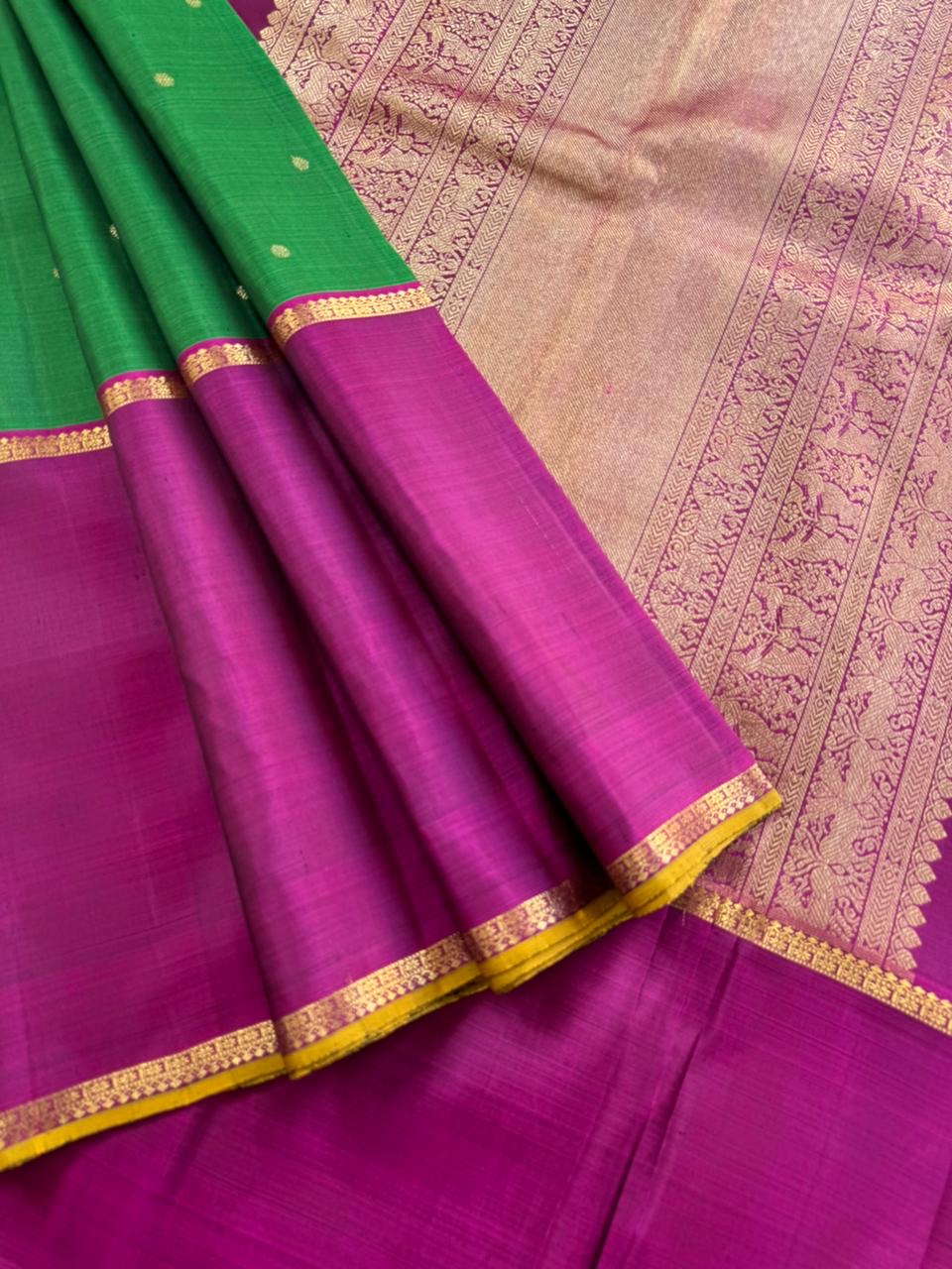 Tasteful Tall Border Kanchivarams - stunning Meenakshi green mubbagam with Ganga jammuna woven borders