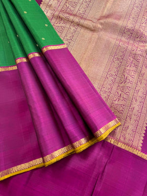 Tasteful Tall Border Kanchivarams - stunning Meenakshi green mubbagam with Ganga jammuna woven borders