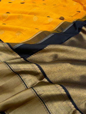 Colour Play on Kanchivaram - vintage style yellow and black korvai Kanchivaram with zari and silk thread woven unique borders