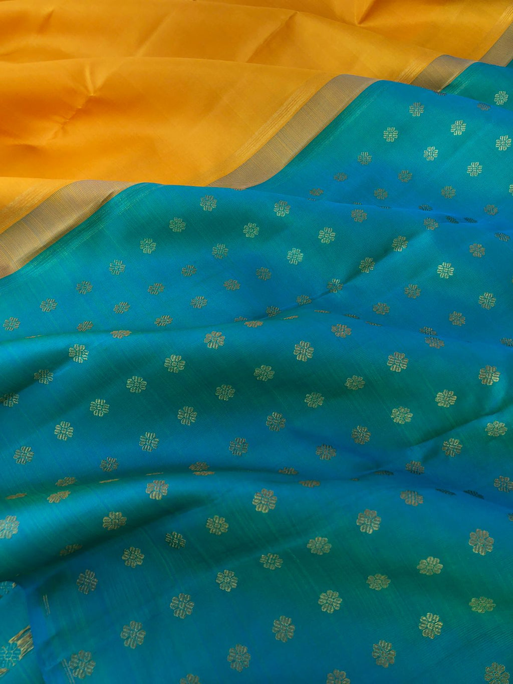 Mohaa - Beautiful Borderless Kanchivarams - absolutely beautiful mustard full plain body with anandha blue kamalam buttas woven pallu and blouse
