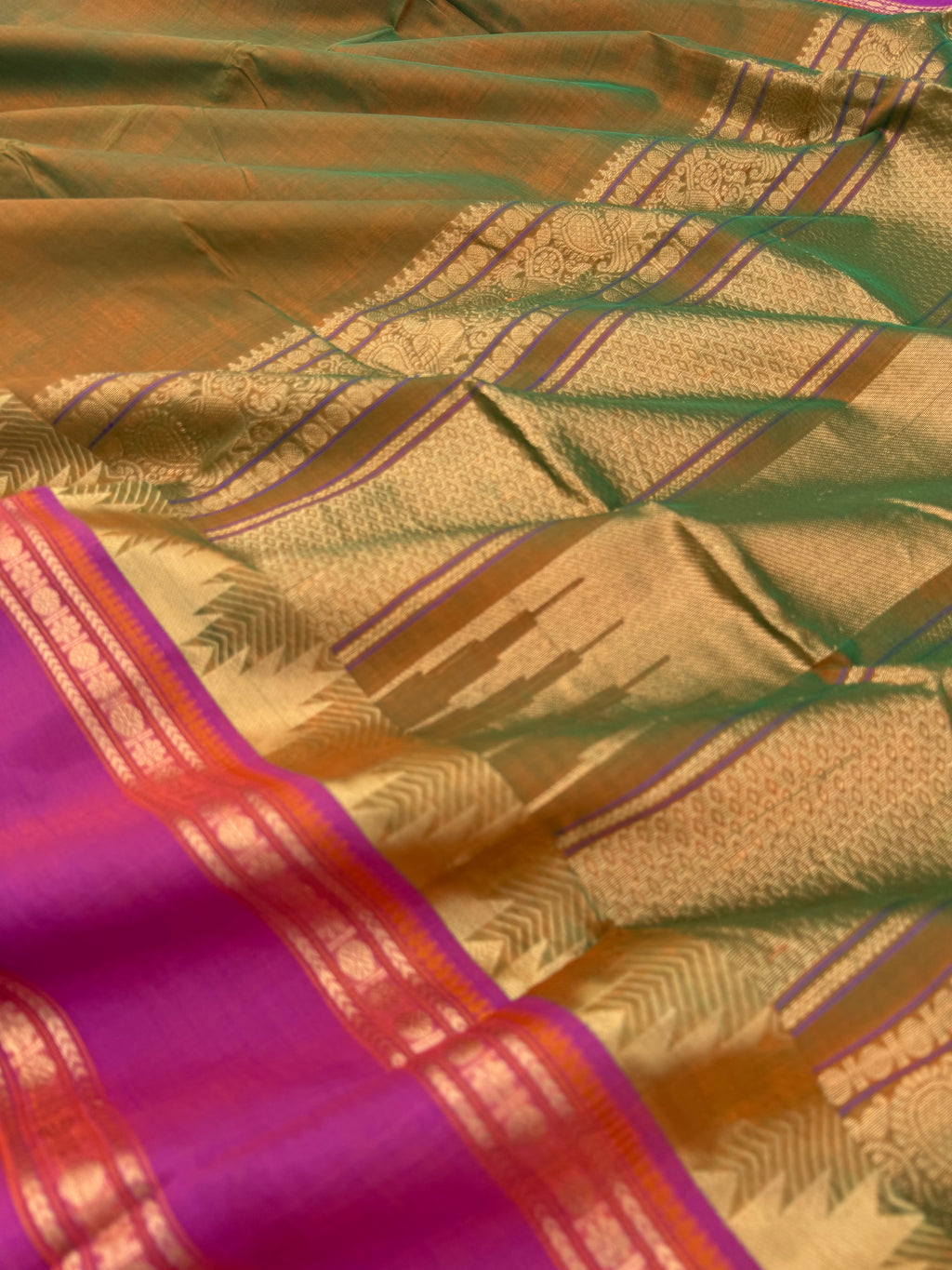 Zari Kissed Silk Cotton - a deep dark honey mustard mixed green with majentha borders