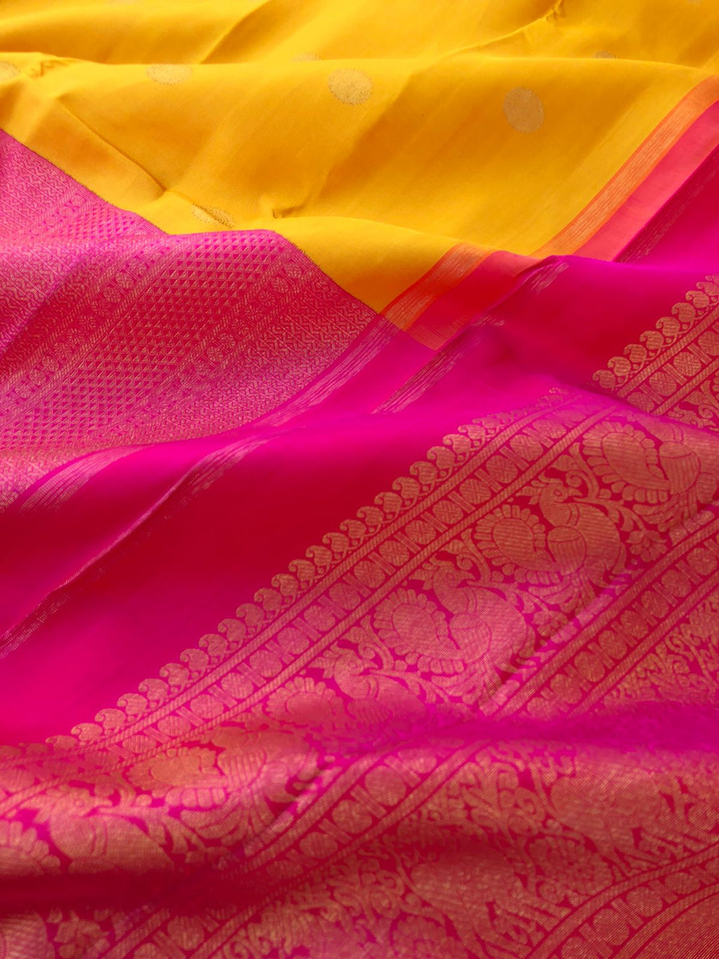 Leela - Legacy Of Kanchivarams - most beautiful aarai bagam ( that is a perfect half and half ) Kanchivaram in vibrant yellow and classy pink