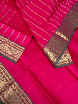 Zari Kissed Silk Cotton - reddish pink vertical veldhari with parrots woven borders