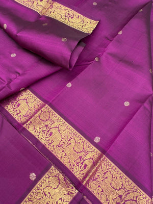 Parvathi - deep dark majentha purple with horse and elephants woven borders