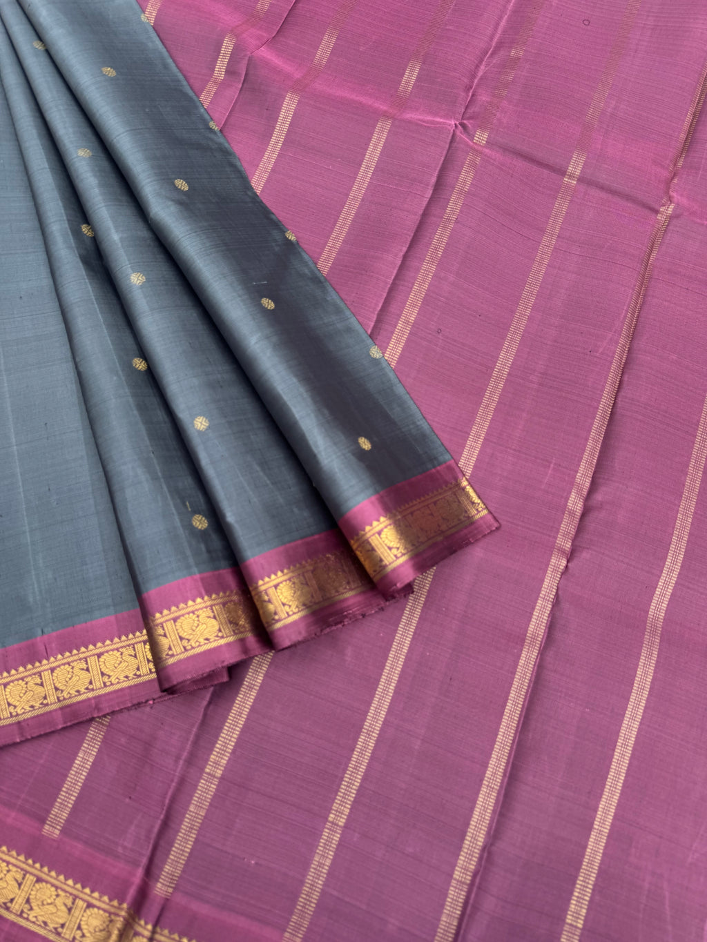 Leela - The bliss of small border Kanchivarams - a steel alloy grey and keva with simple strips woven pallu