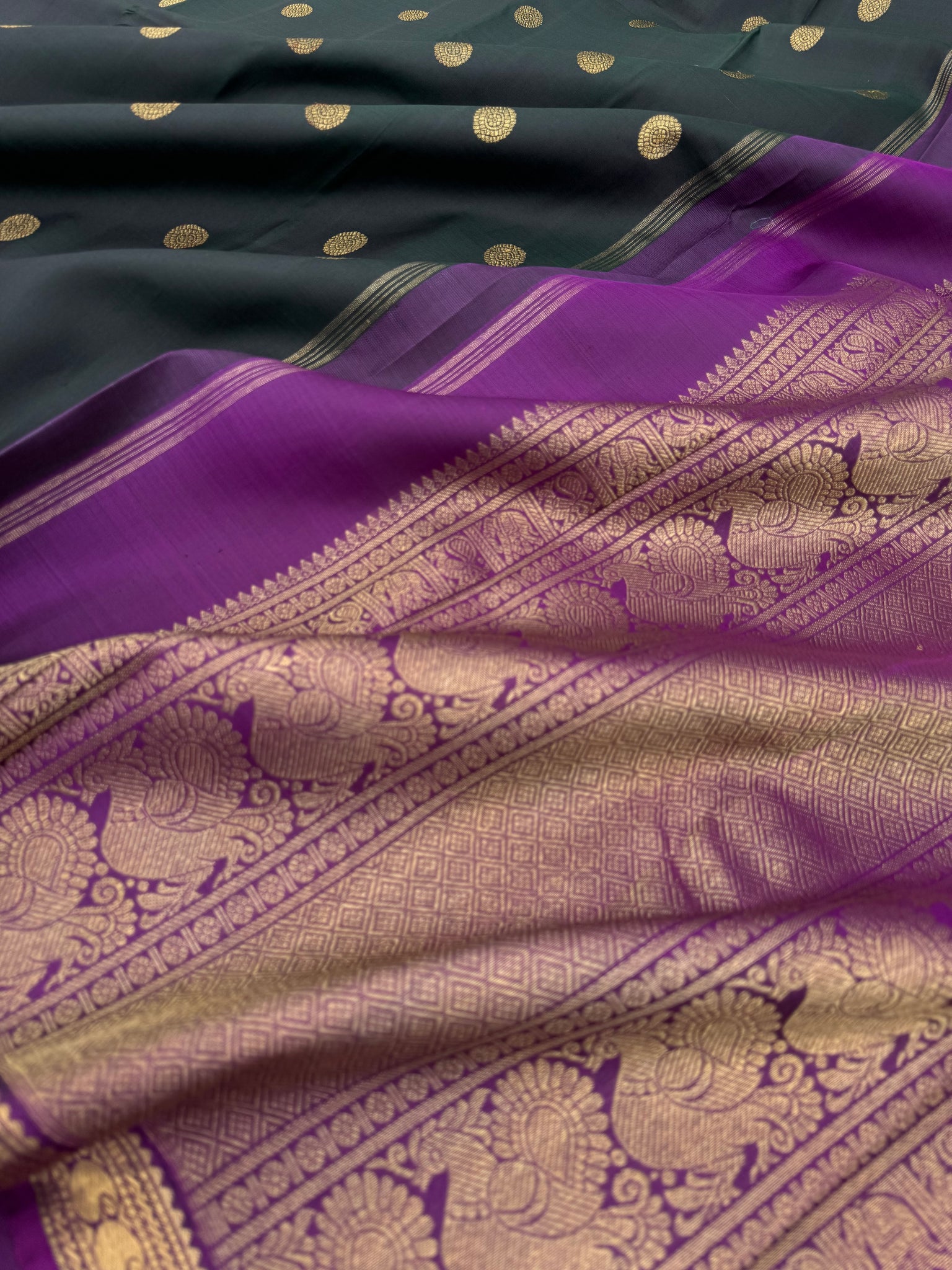 Leela - The bliss of small border Kanchivarams - dark deep intense karum pachai with majentha pallu and blouse