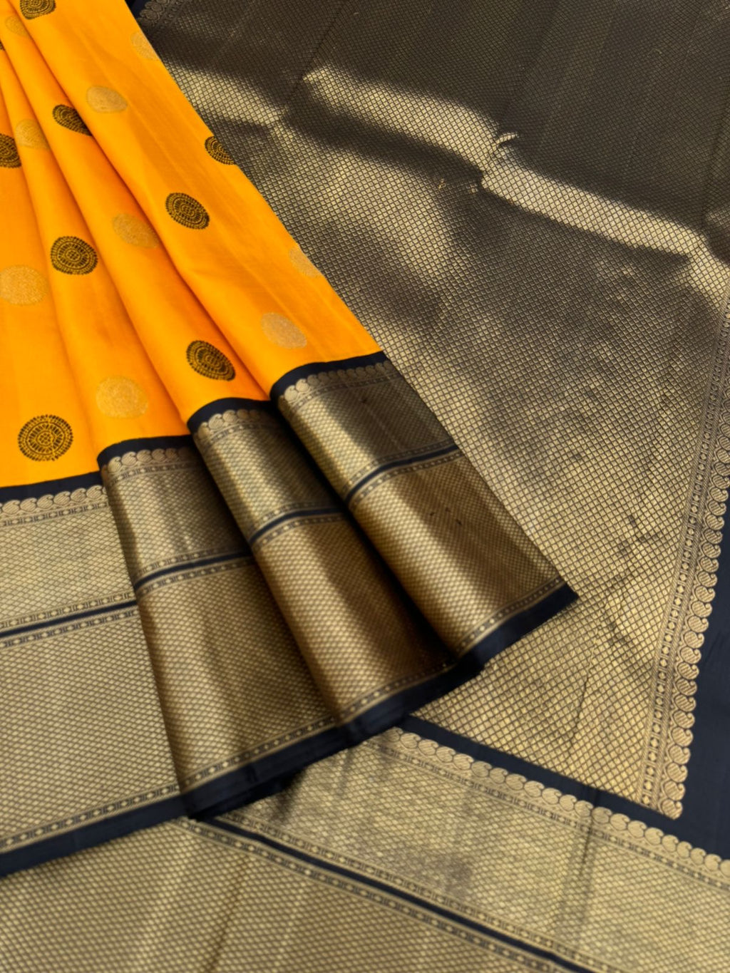 Colour Play on Kanchivaram - vintage style yellow and black korvai Kanchivaram with zari and silk thread woven unique borders