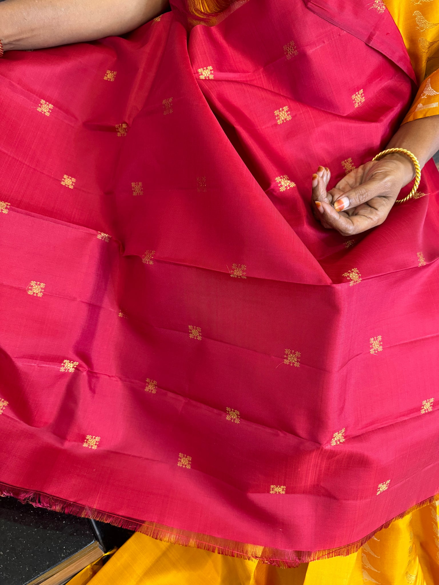 Kanchivaram Concepts - a amazing raising parrots of silver and gold zari woven buttas in a golden mustard body with red pallu and blouse