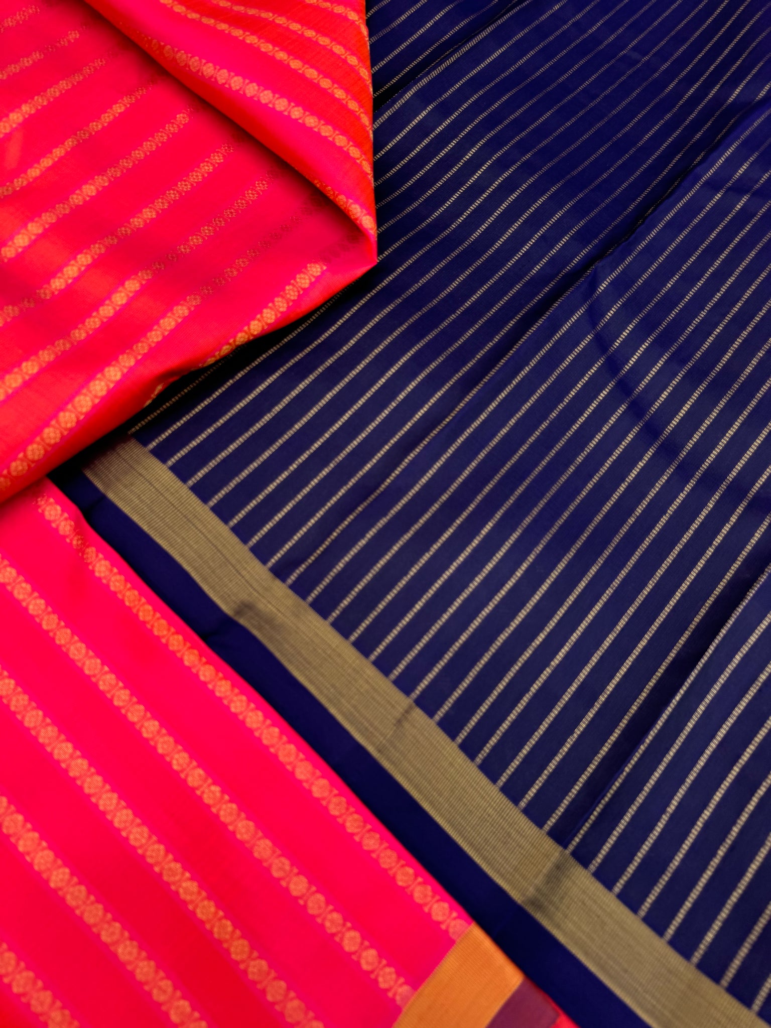 Album Untouched - a stunning orange mixed pink dual tone rudurakasham woven vertical veldhari with deep navy blue pallu and blouse