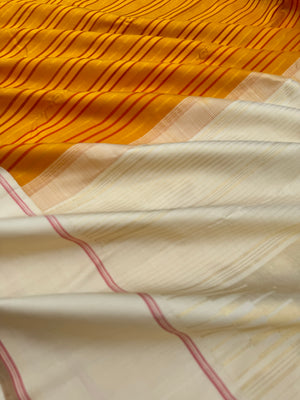 Diwali Edits - Soulful Kanchivaram - absolutely brilliant mustard with red and gold zari strips woven body with off white borders pallu and blouse