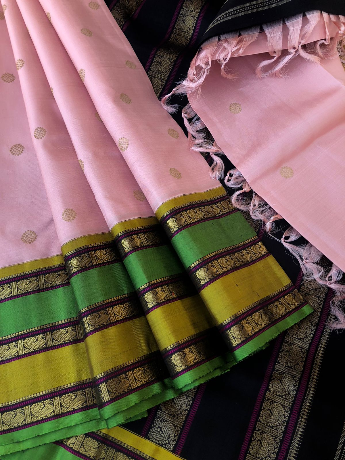 Meenakshi Kalayanam - Authentic Korvai Kanchivarams - the best of best pastel pale pink with stunning dual colour woven borders with black pallu and blouse