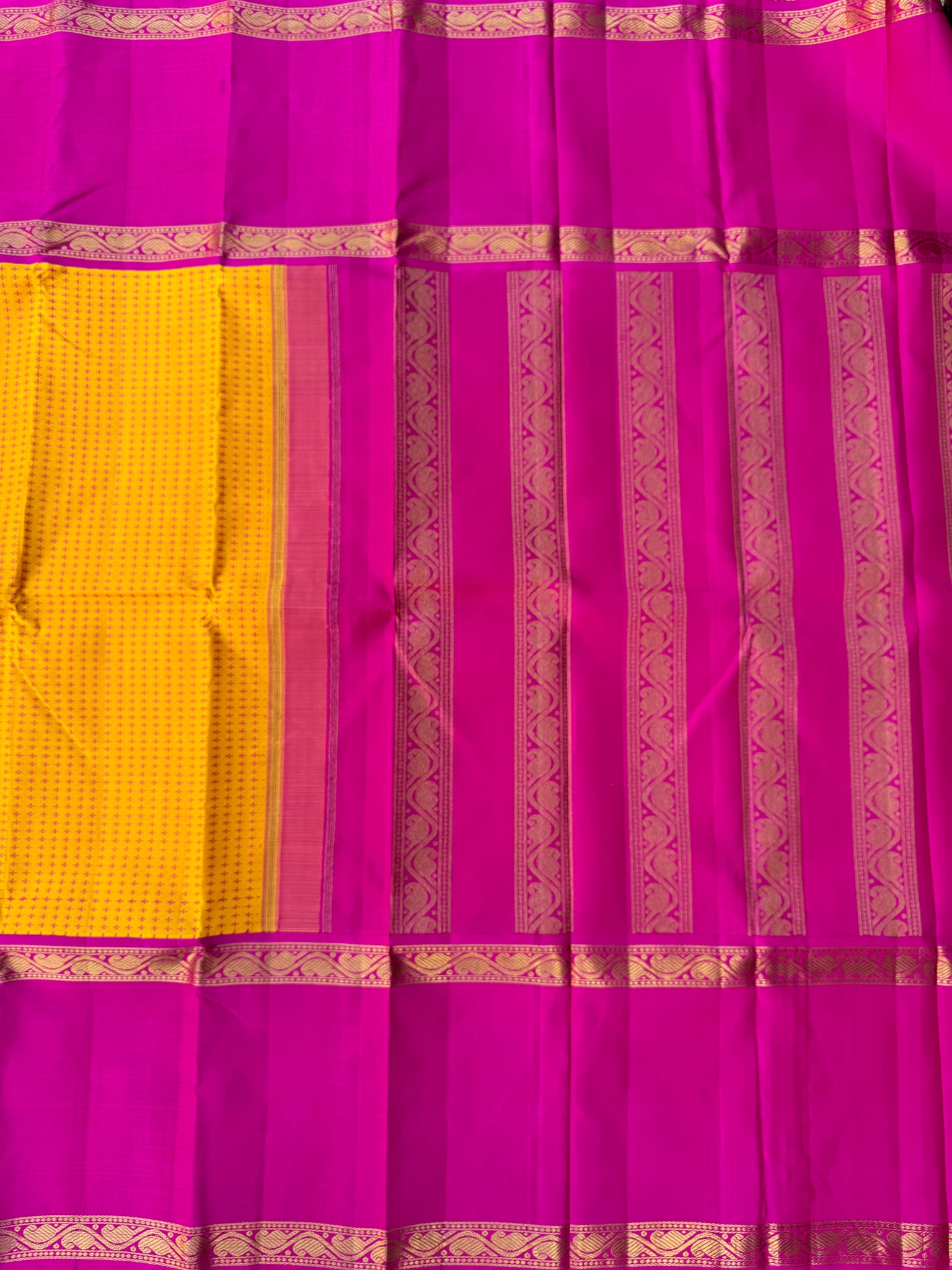 Essence of Traditional Kanchivarams - a gorgeous vintage type broad borders mustard and sweet pink full body woven pluse buttas