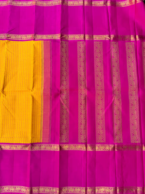 Essence of Traditional Kanchivarams - a gorgeous vintage type broad borders mustard and sweet pink full body woven pluse buttas