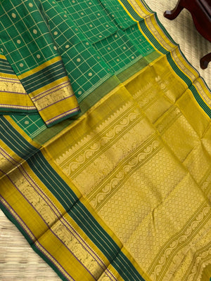Meenakshi - the beautiful Meenakshi green and golden fenugreek mustard with moppula woven borders and kattam buttas woven body