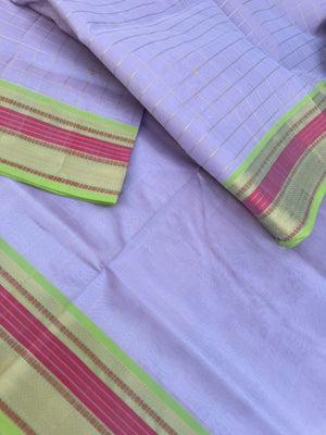 Pastels on Zari Kissed Silk Cotton - a most beautiful pastel lavender muthukattam and buttas woven together the best part is the apple green