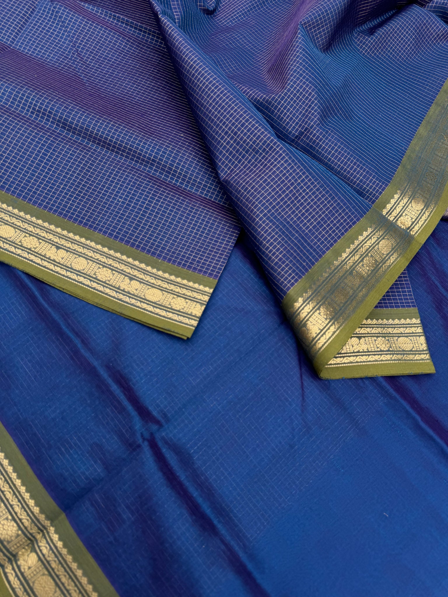 Zari Kissed Silk Cotton - a stunning two tone burnt blue oosi kattam with small borders