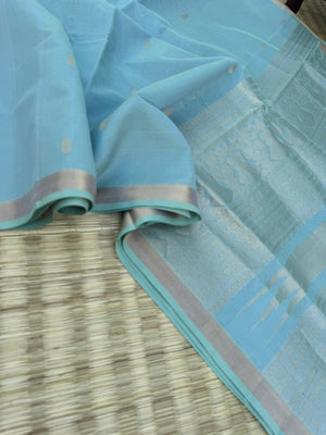 Pastels on Zari Kissed Silk Cotton - a pastel ice blue with one inch tissue borders and grand pallu ( u need to view this saree in natural light )