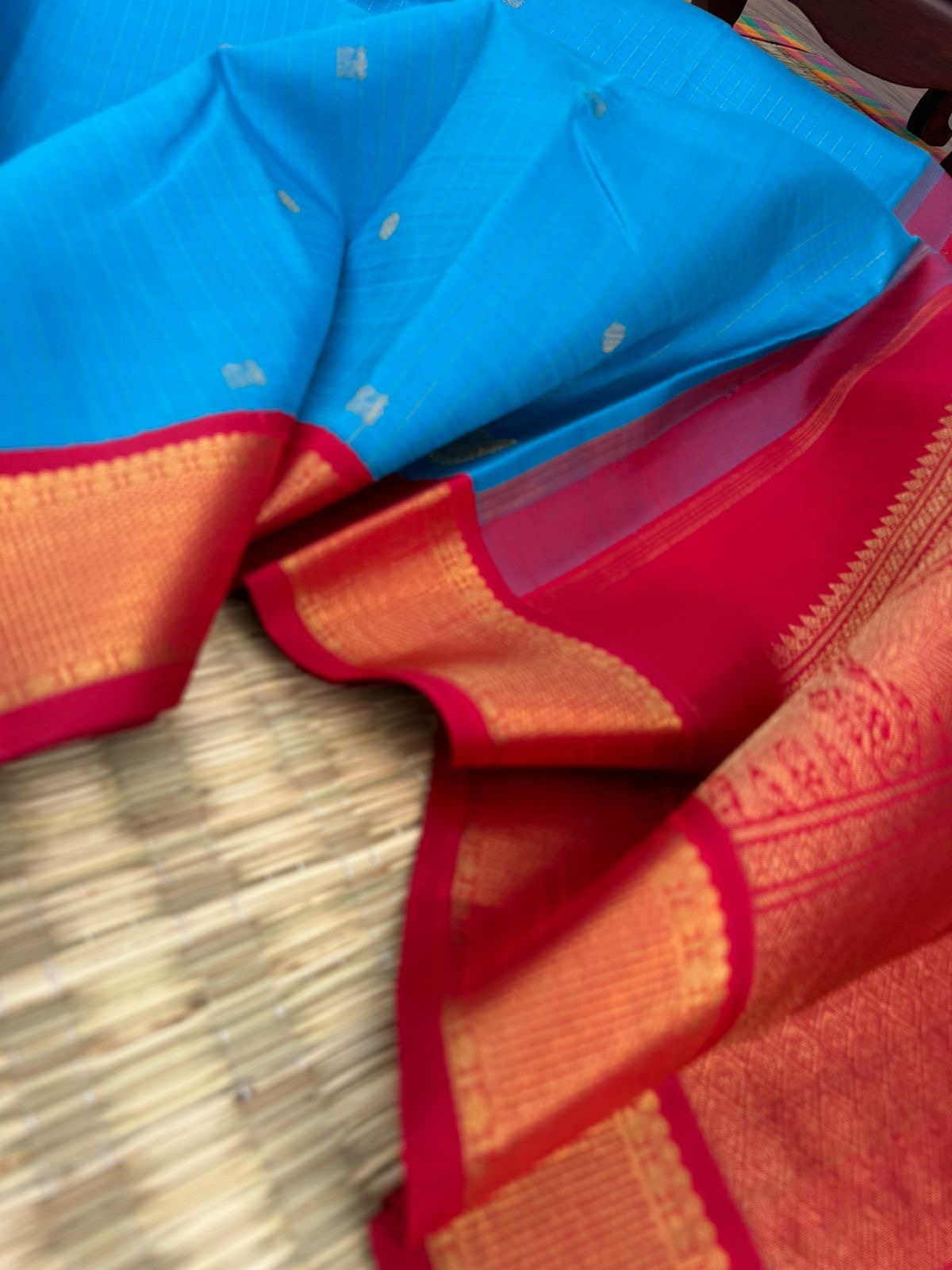 Kanchivaram Trunk - gorgeous Anandha blue and red with vertical zari strips and buttas with aarai maadam woven borders