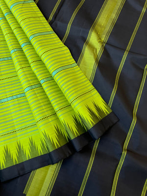 Kaavyam on Korvai Kanchivaram - apple green and black muthu veldhari
