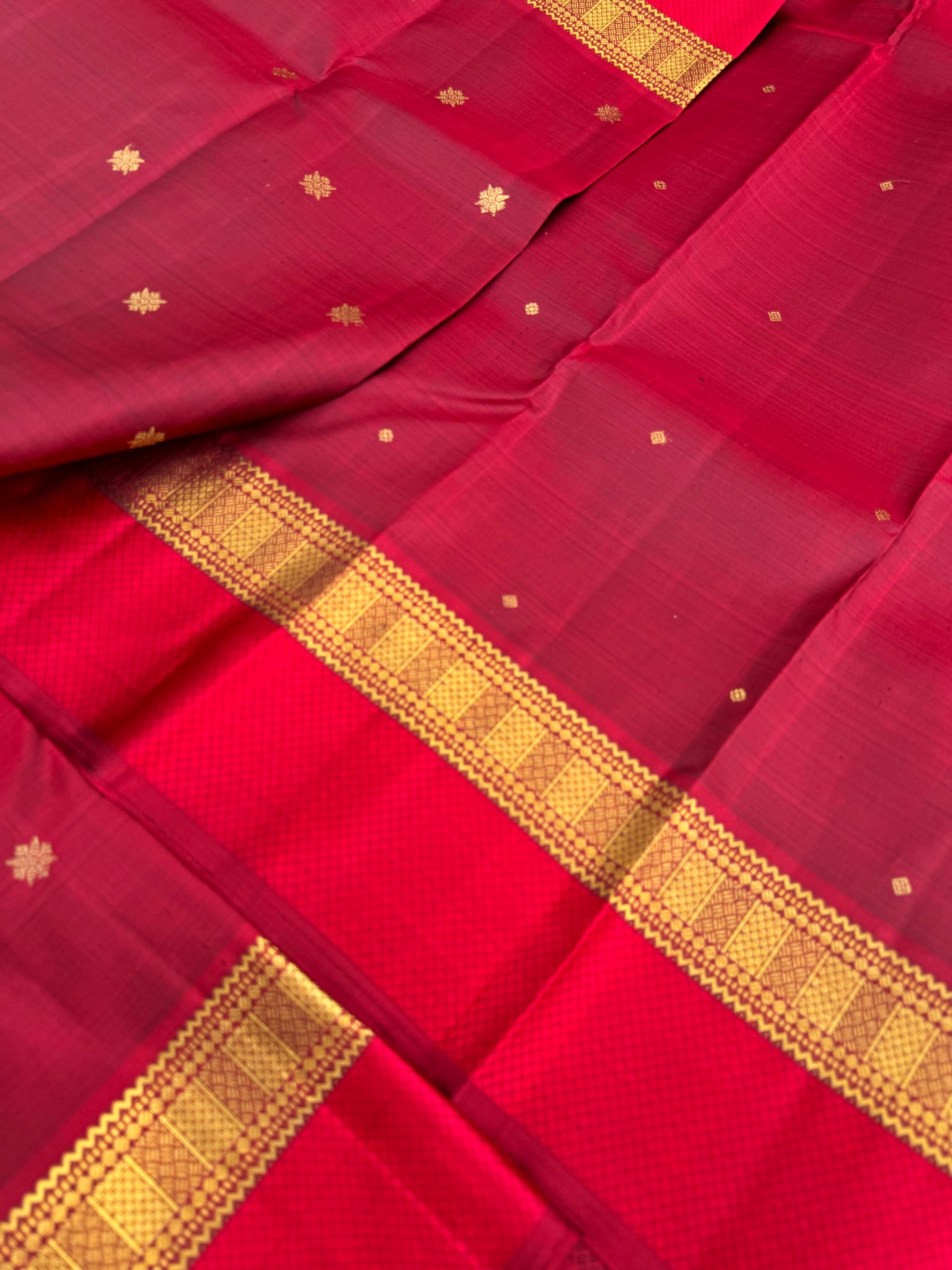 Molten Play on Kanchivaram - deep dark metallic reddish maroon with silk and zari woven borders