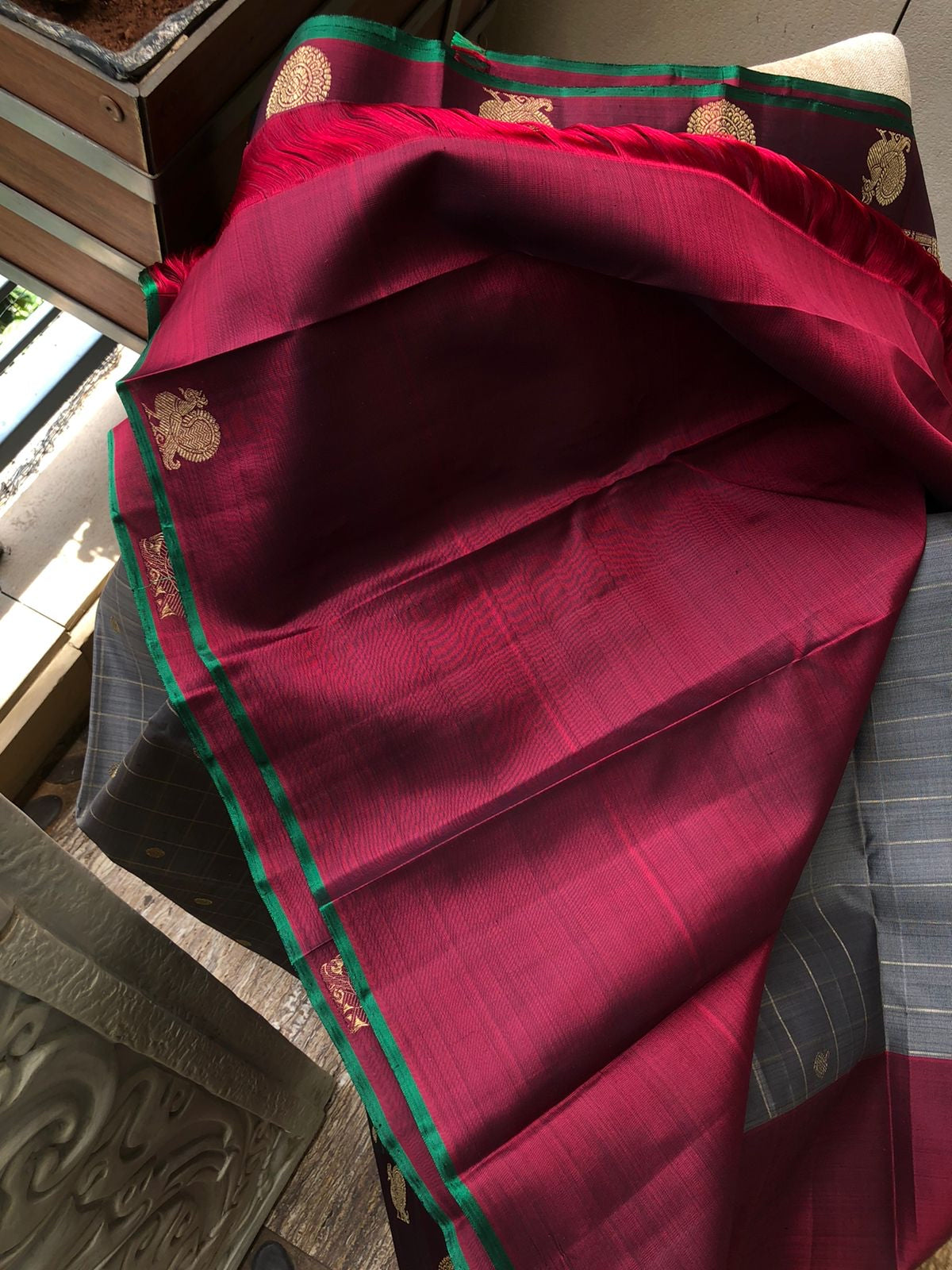 Darker Kanchivarams - unusual and rare find grey with a tint of elachi green chex buttas woven body with deepest maroon mayil chackaram borders