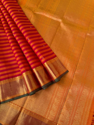 Kattam Koodu on Kanchivaram - red and rusty koodu ( Stripes ) with solid gold zari woven borders