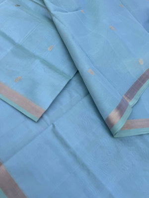 Pastels on Zari Kissed Silk Cotton - a pastel ice blue with one inch tissue borders and grand pallu ( u need to view this saree in natural light )