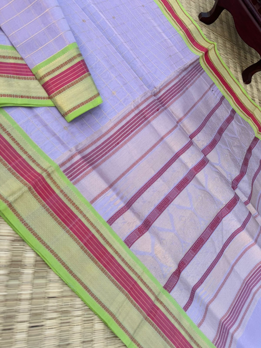Pastels on Zari Kissed Silk Cotton - a most beautiful pastel lavender muthukattam and buttas woven together the best part is the apple green