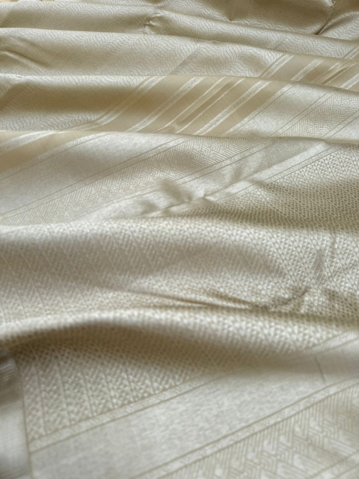 Saraswathi - the beige base and full body silver zari woven Kanchivaram