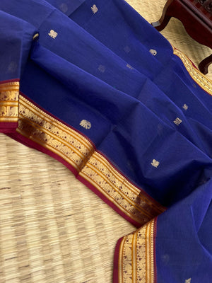 Dark Edition on Zari Kissed Silk Cotton - dark deep blue with one row of parrot woven buttas in the junction of pallu and blouse