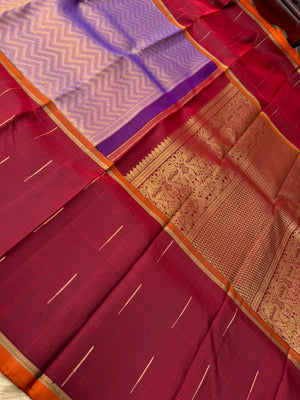 Tasteful Tall Border Kanchivarams - stunning lavender and gold Chevron V woven body with deep red long korvai woven borders with raindrops weave