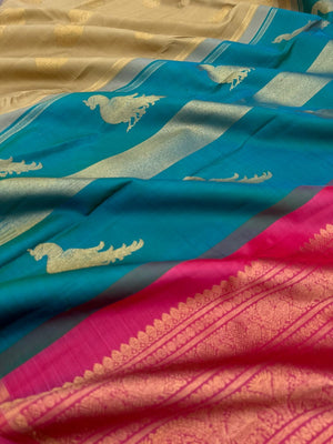 Mohaa - Rarest Borderless Kanchivarams - a biscuit tone irruthalaipakshi butta body with two solid colours uniquely woven pallu