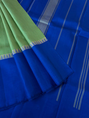 Art of Kai Korvai Kanchivaram - green and off white kasa kasa kattam with ink blue borders
