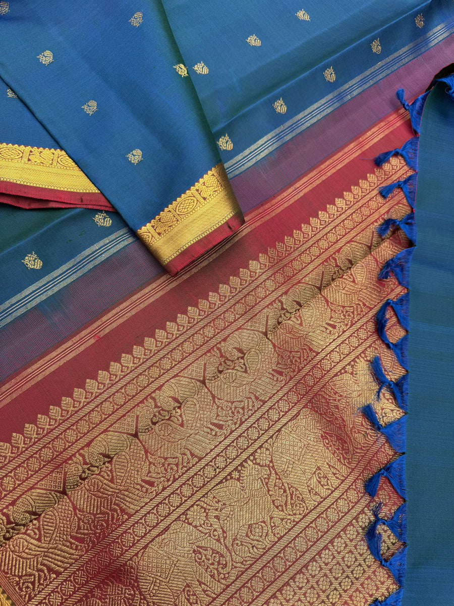Swarnam - Small Border Kanchivaram -a deep dark peacock blue on rusty ...