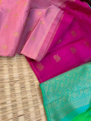 Uniquely Woven Kanchivarams - baby pink Mayil chackaram woven body with rain pink and aqua two colour woven long pallu