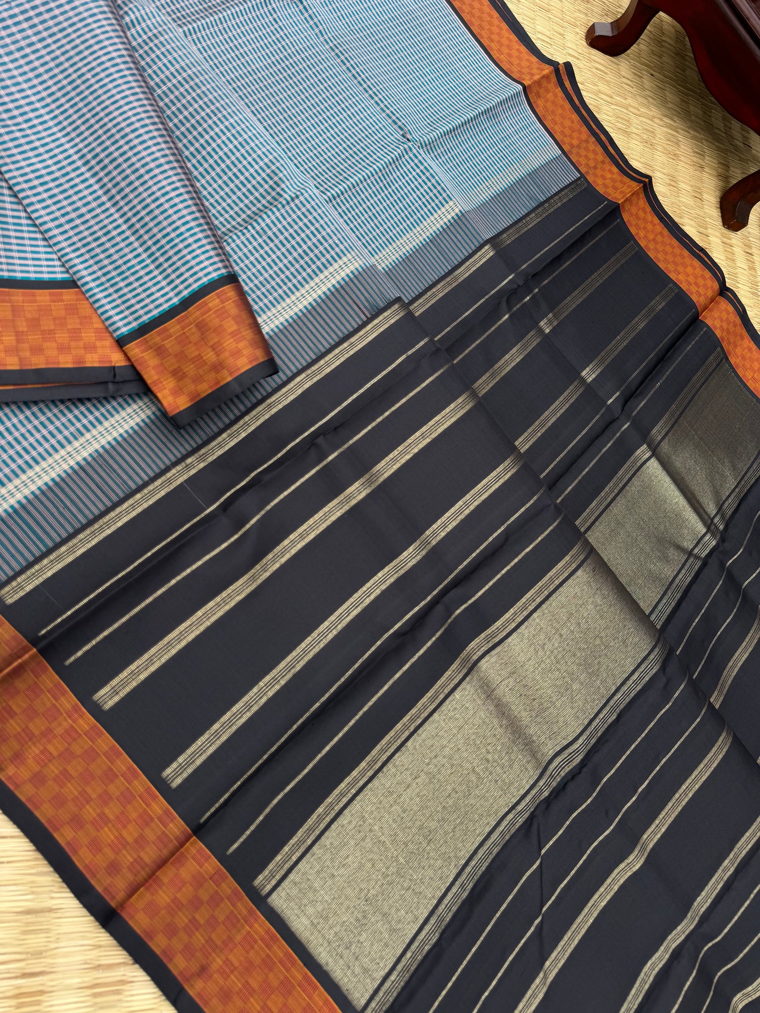 Album Vidhyasam - a metallic bluish grey kottadi kattam with mat chex borders and black pallu and blouse something unique and unusual