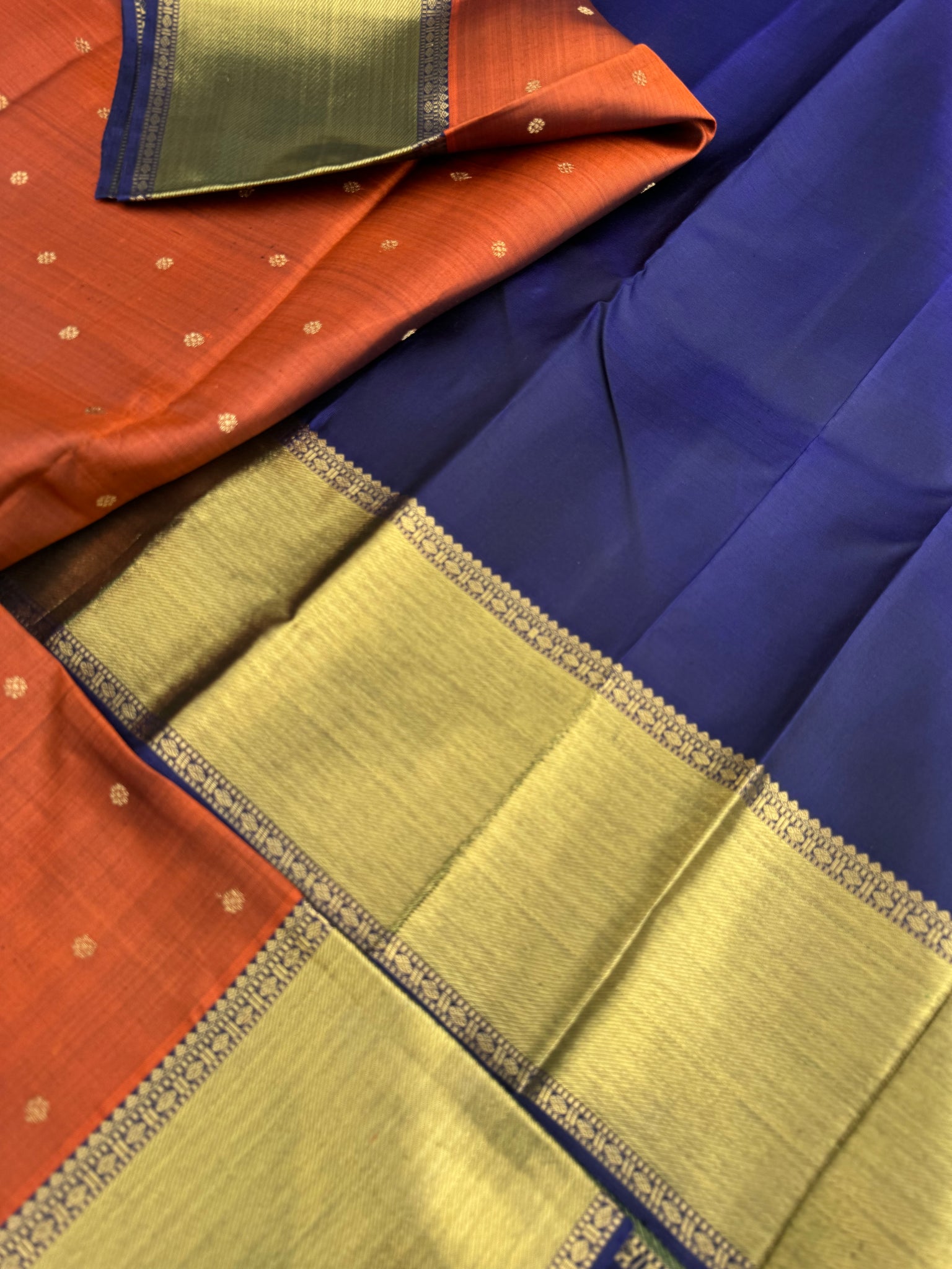 Molten Play on Kanchivaram - stunning Molten Metallic rusty caramel brown and navy blue with grander version of pallu and borders