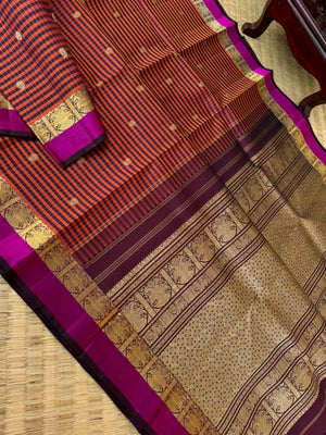 Kattam Koodu on Kanchivaram - rust and maroon podi kattam with Irruthalaipakshi woven borders