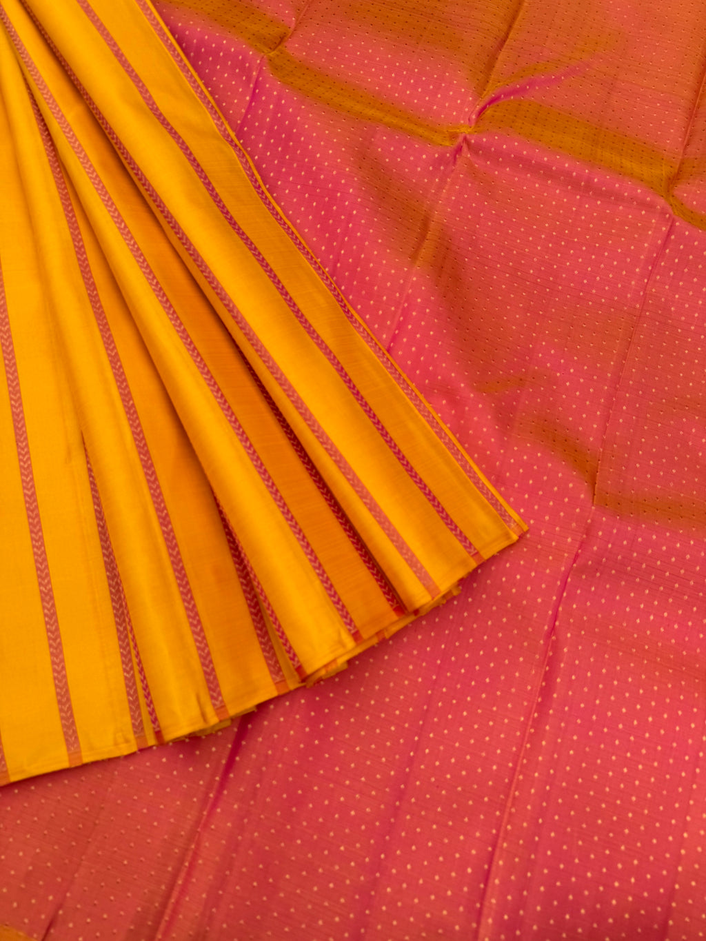 Album Untouched - a stunning yellow vertical veldhari woven body with dual tone peach grand zari woven pallu and blouse