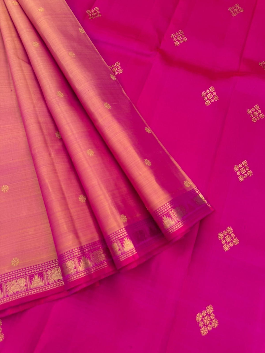Leela - The bliss of small border Kanchivarams - a peach and pink with different styles buttas woven pallu and blouse