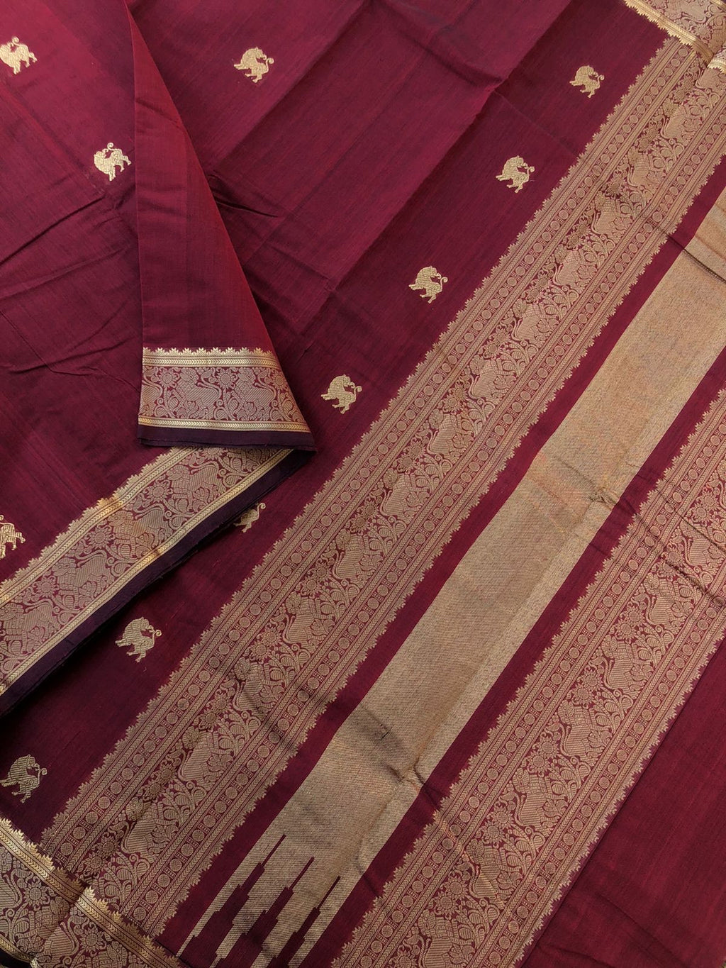 Mangalavastaram - Zari Touched - beautiful deep reddish maroon yali woven borders with yali woven buttas