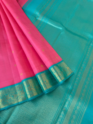 Meenakshi Kalayanam - Connected By Korvai - the stunning panner rose and turquoise small borders