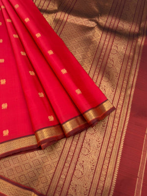 Leela - The bliss of small border Kanchivarams - brick red and maroon the best part of the saree is blouse has woven buttas