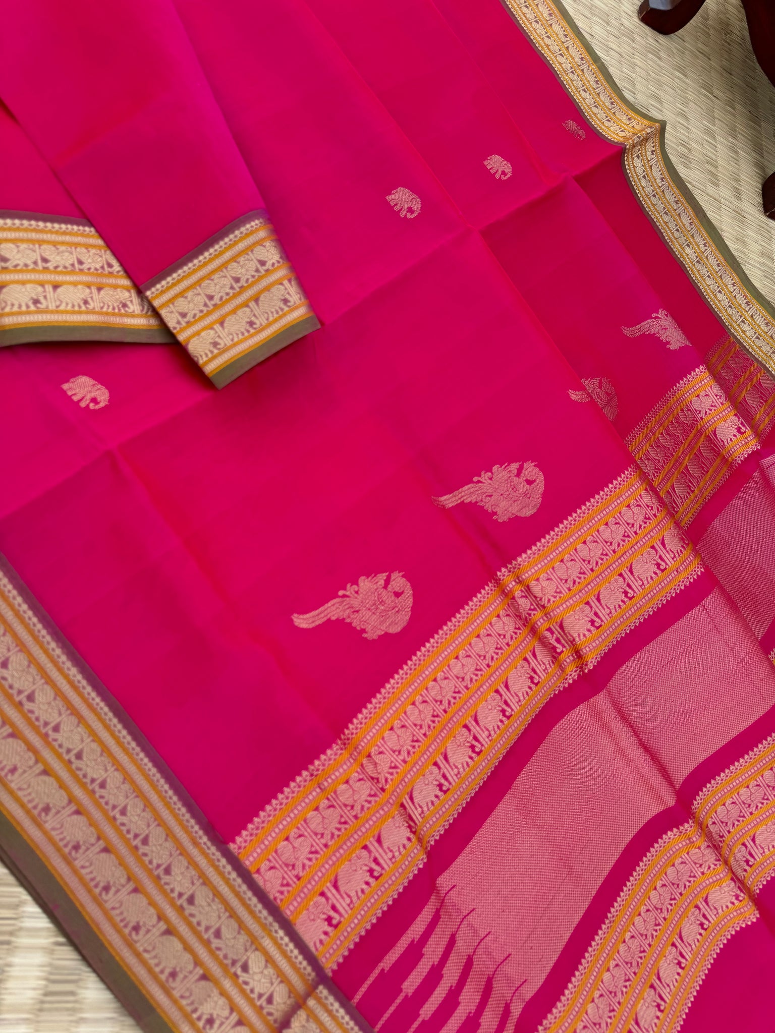 Zari Kissed Silk Cotton -gorgeous pink with parrots woven in the junction of pallu and body
