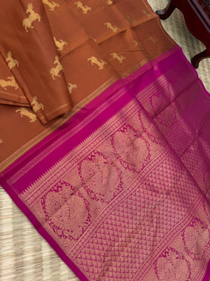 Corporate Kanchivarams - a caramel brown and pink borderless deer buttas