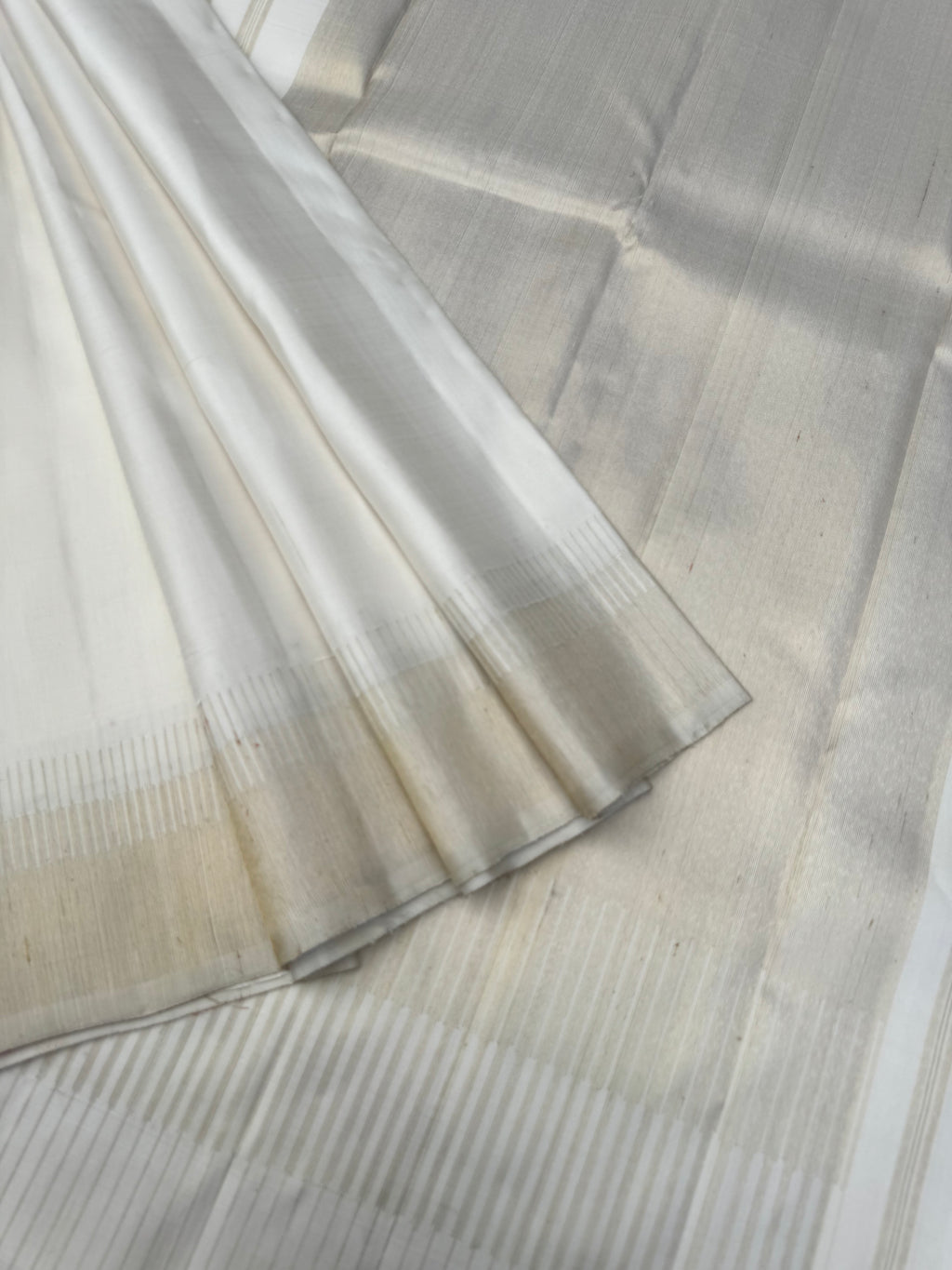 Aadthyayam – The Everyday Kanchivaram - a classy off white seep reek 8 kol kanchivaram- this saree may have some irregularities that is the authenticity of this handloom weave