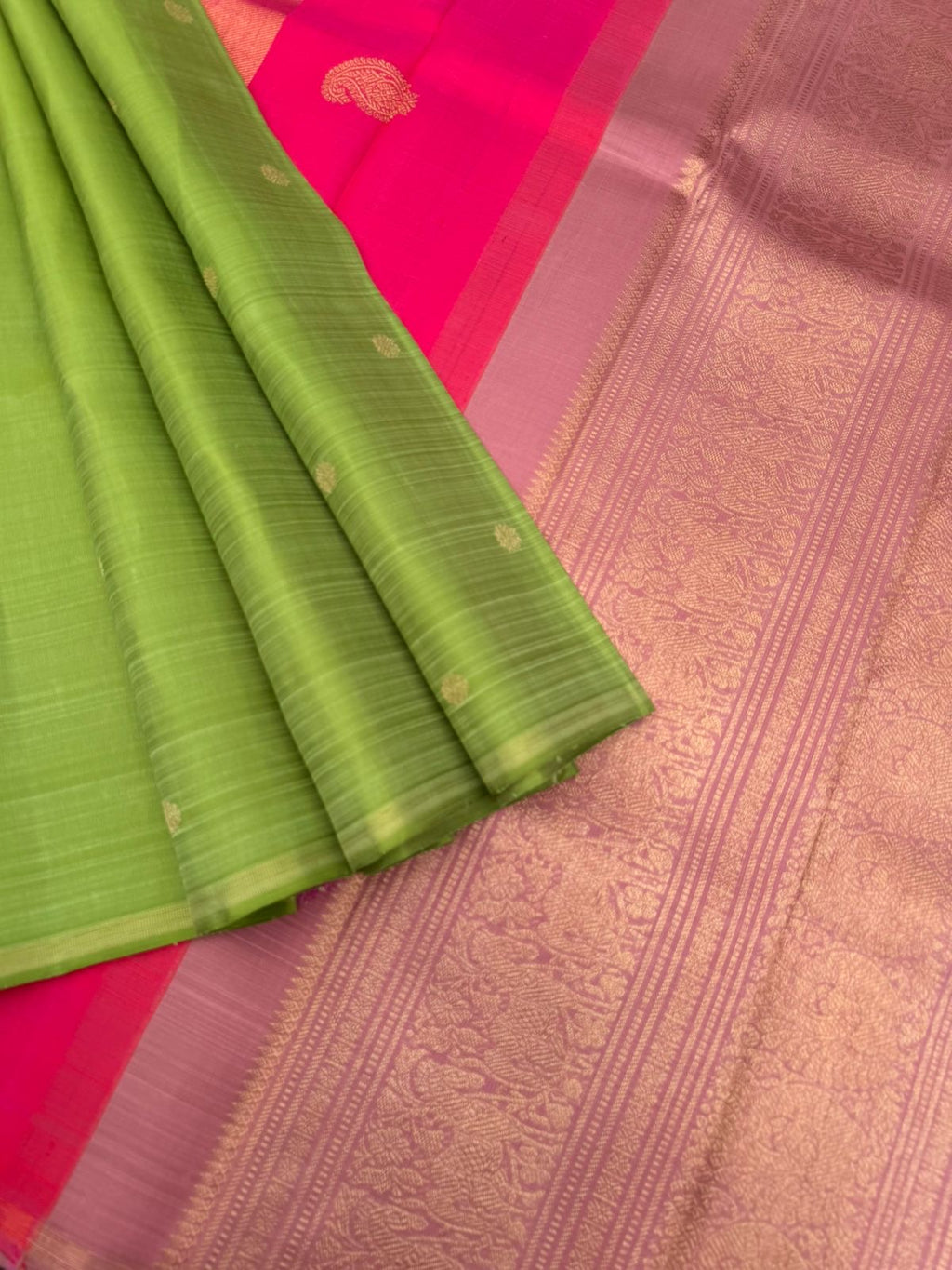 Mohaa - Rarest Borderless Kanchivarams - A fresh green with two part pallu one with paisley buttas other with pale pink grand weave