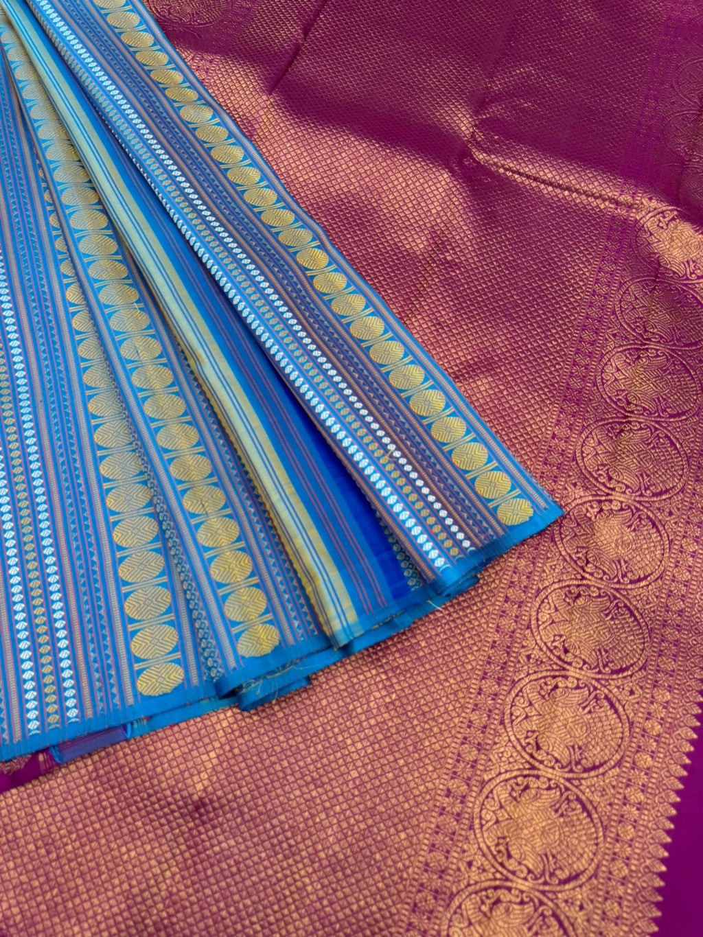 Album Untouched - a deep sulphate blue and deep majenta full body has vertical varusai pett weave one of a kind saree