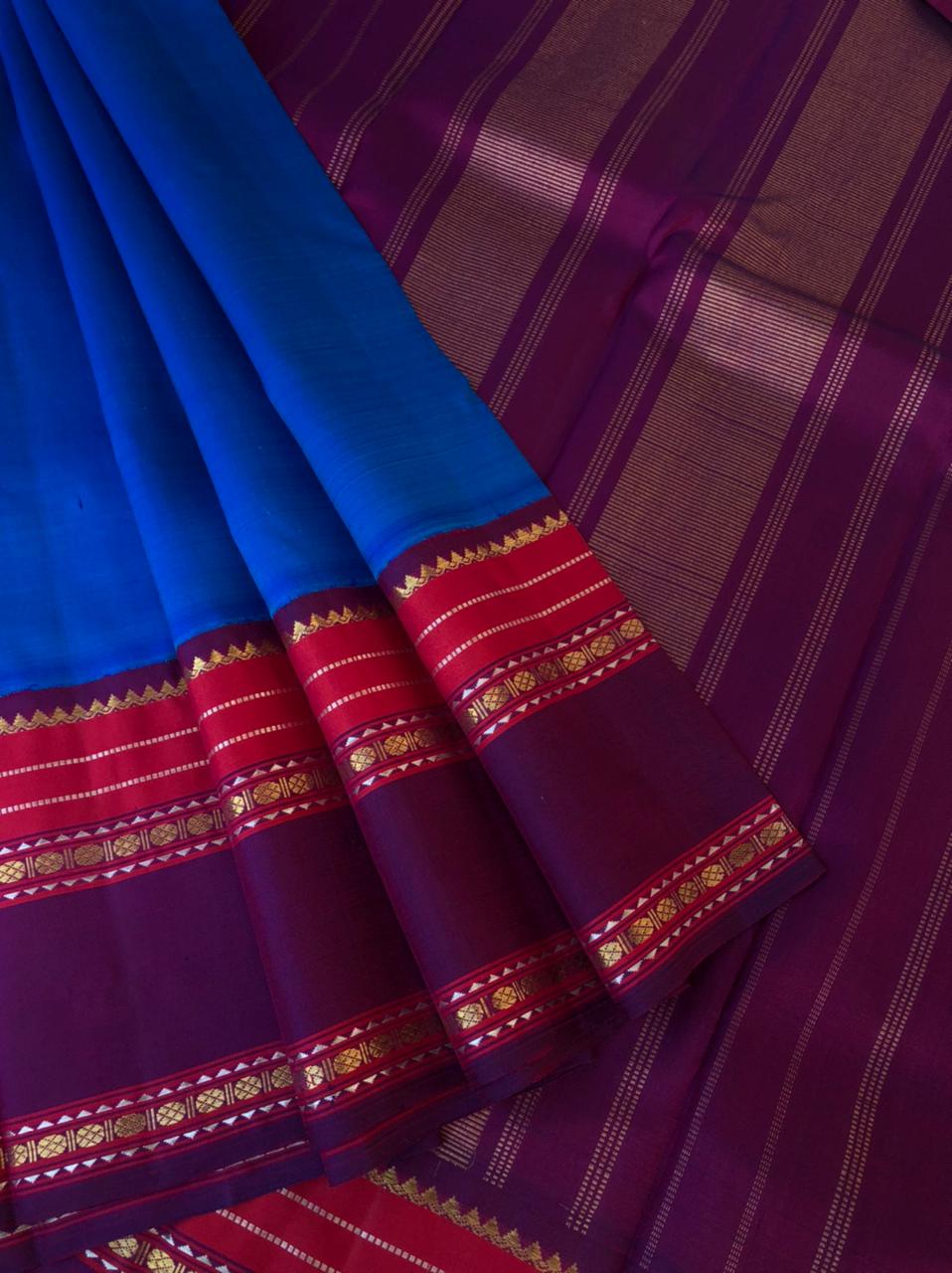 Varam - Kanchivarams Inspired from our Grandmother’s Trunk - beautiful Deep Pepsi can blue and deep purple with moppula woven borders