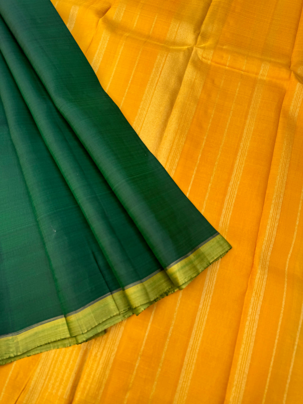 Mohaa - Beautiful Borderless Kanchivaram - a full plain meenakshi green body with golden mustard pallu and blouse, you can wear any kind of diamond or gold jewellery for this saree, definitely the jewellery will speak